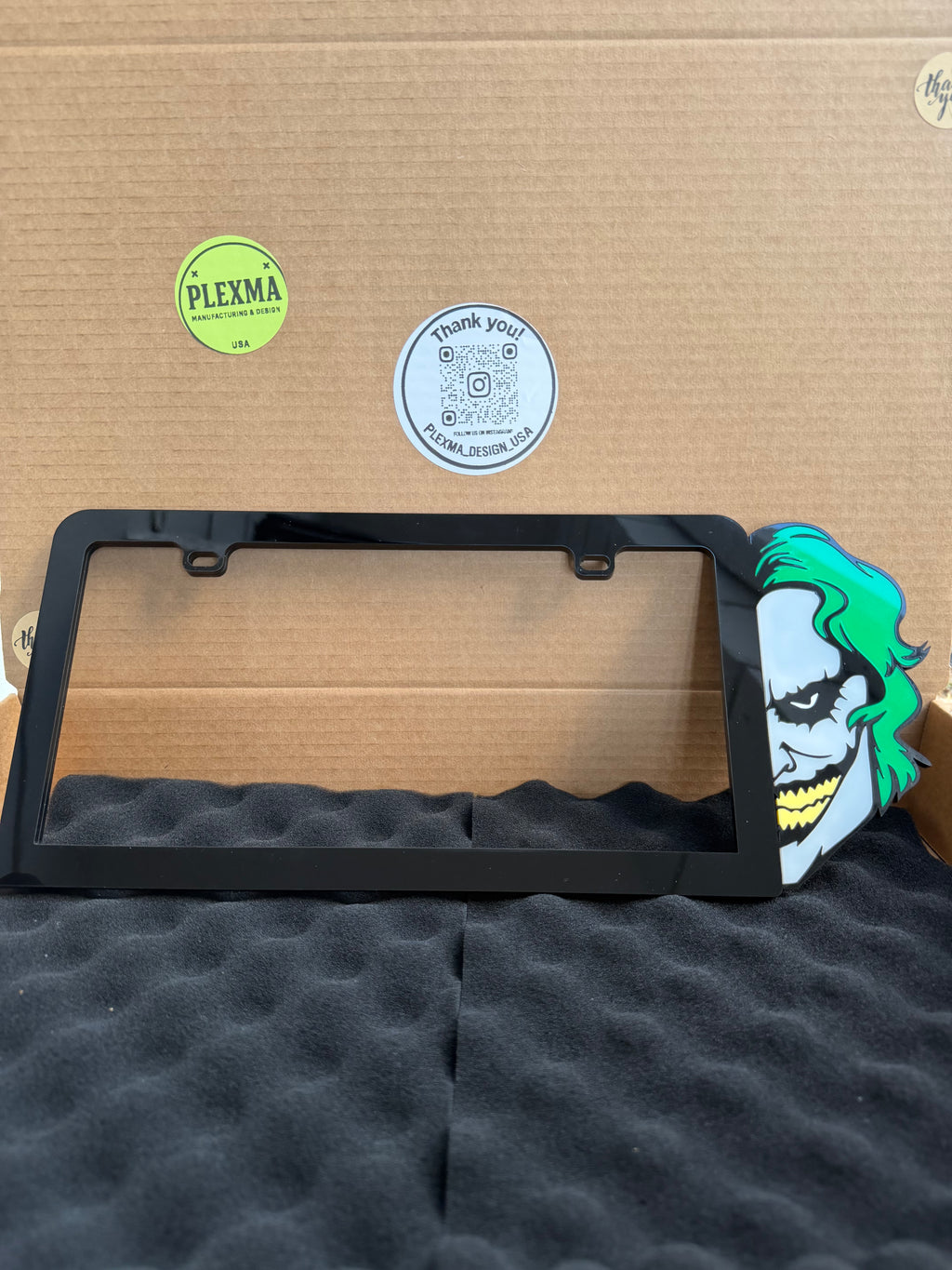 Joker 3D black acrylic license plate frame with raised logo, handmade in USA