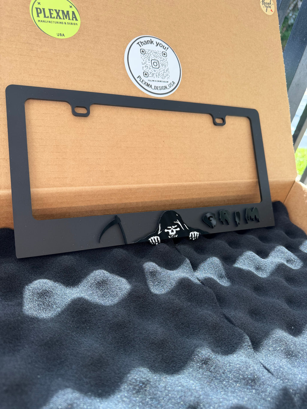 Grim Reaper themed license plate frame, 3D layered black acrylic, weatherproof