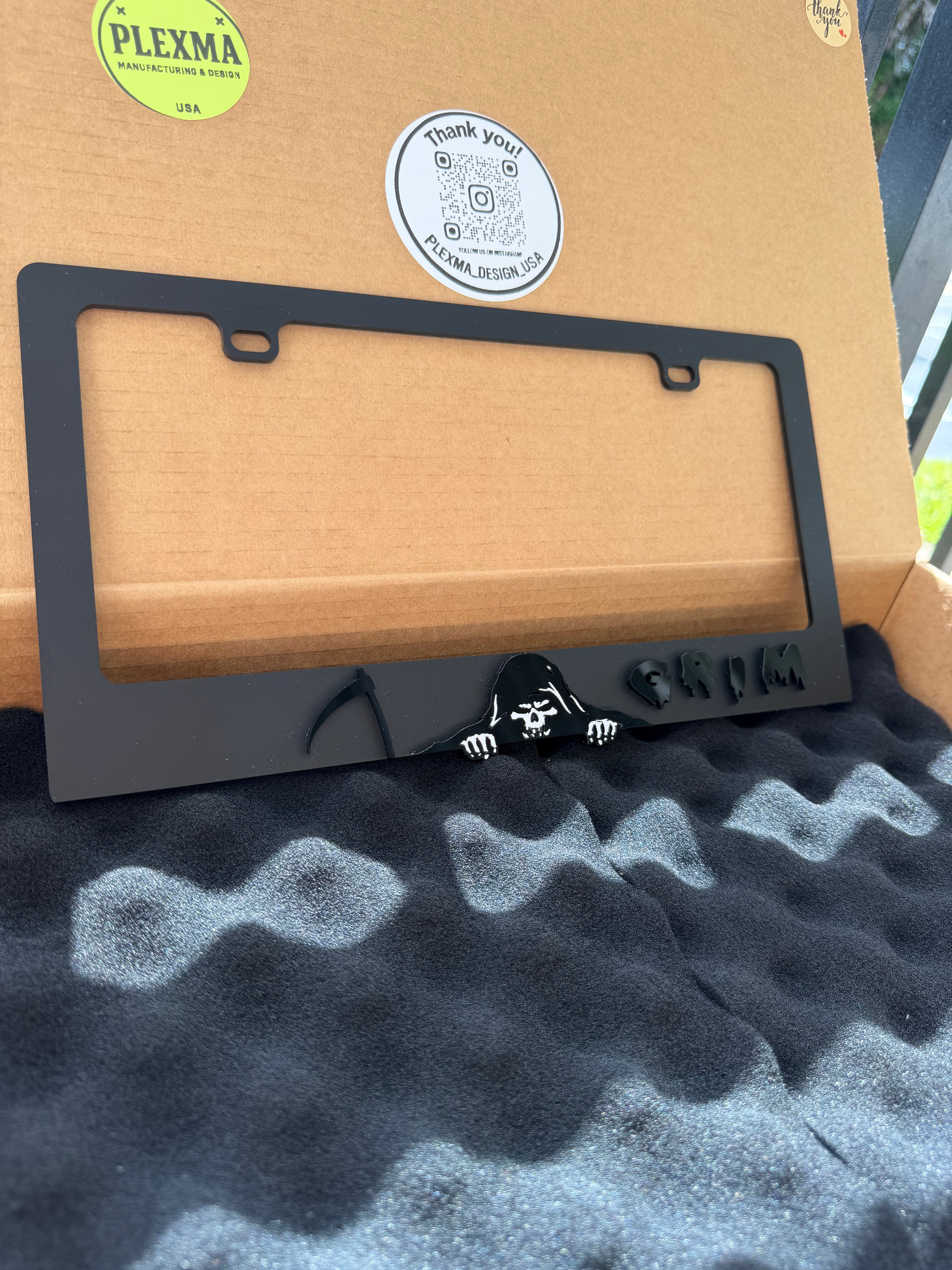 Grim Reaper themed license plate frame, 3D layered black acrylic, weatherproof