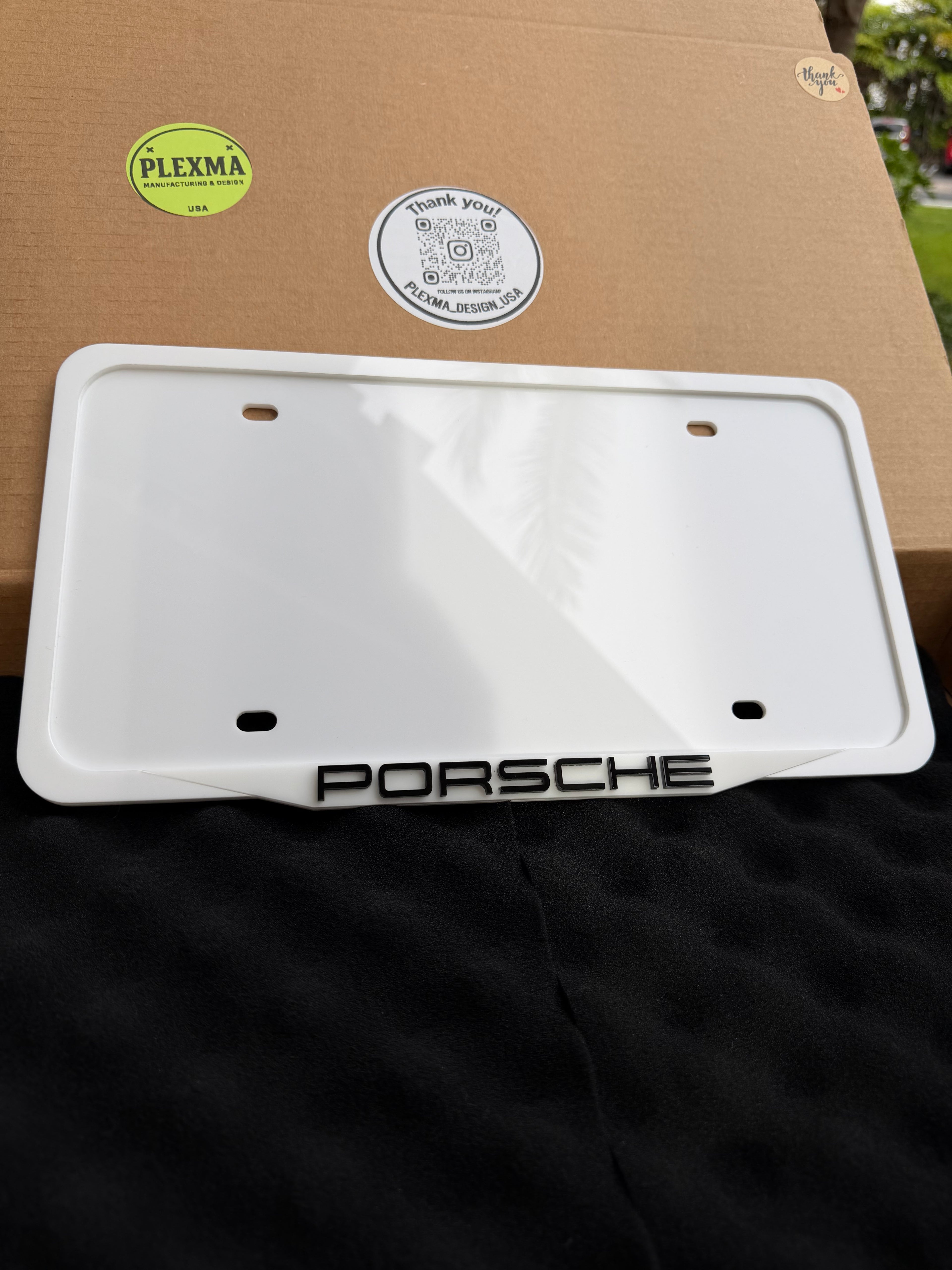 Glossy white 3D acrylic Porsche style license plate frame premium car accessory