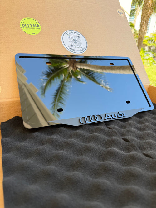 Audi 3D license plate frame in glossy black acrylic, handmade in USA