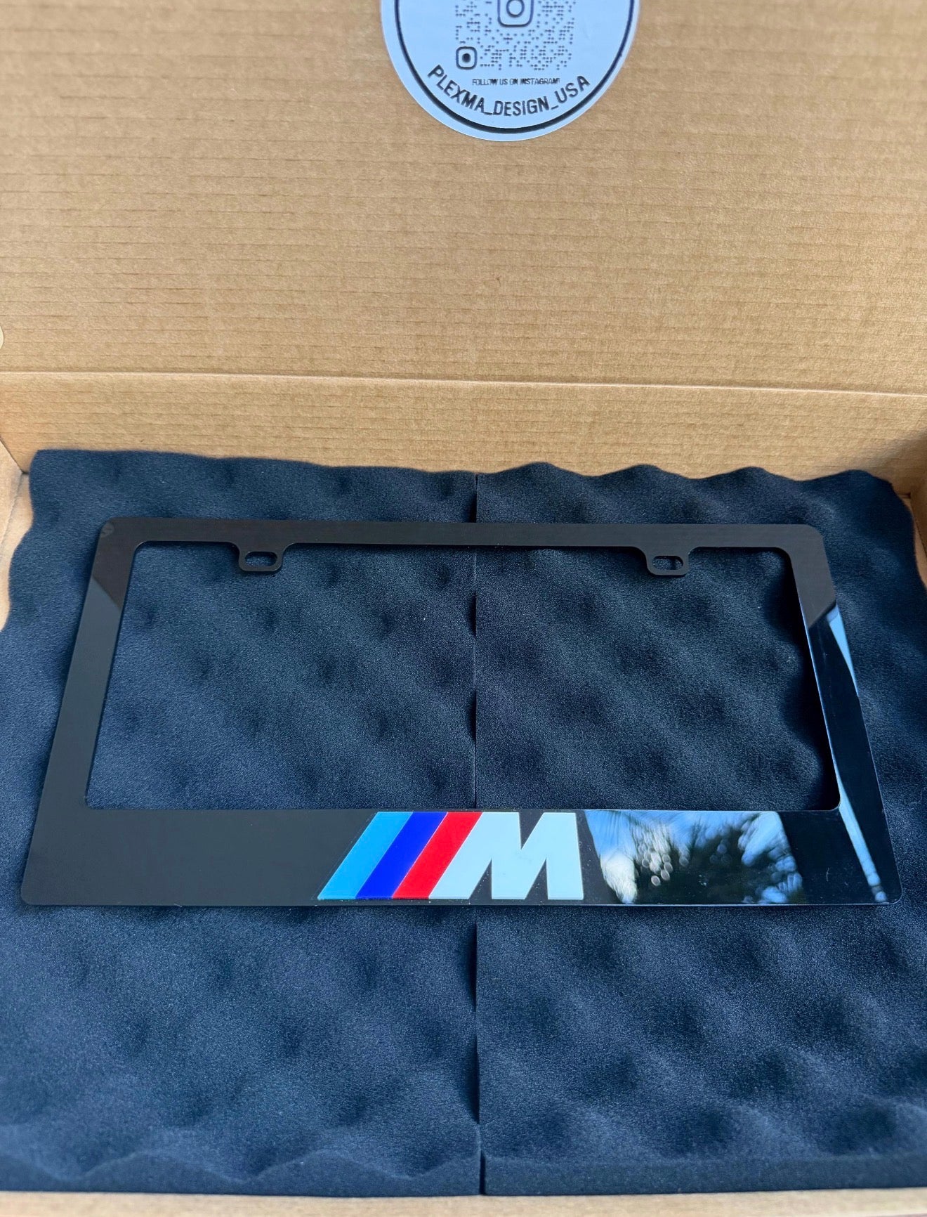 BMW M 3D black acrylic license plate frame with raised logo, handmade in USA