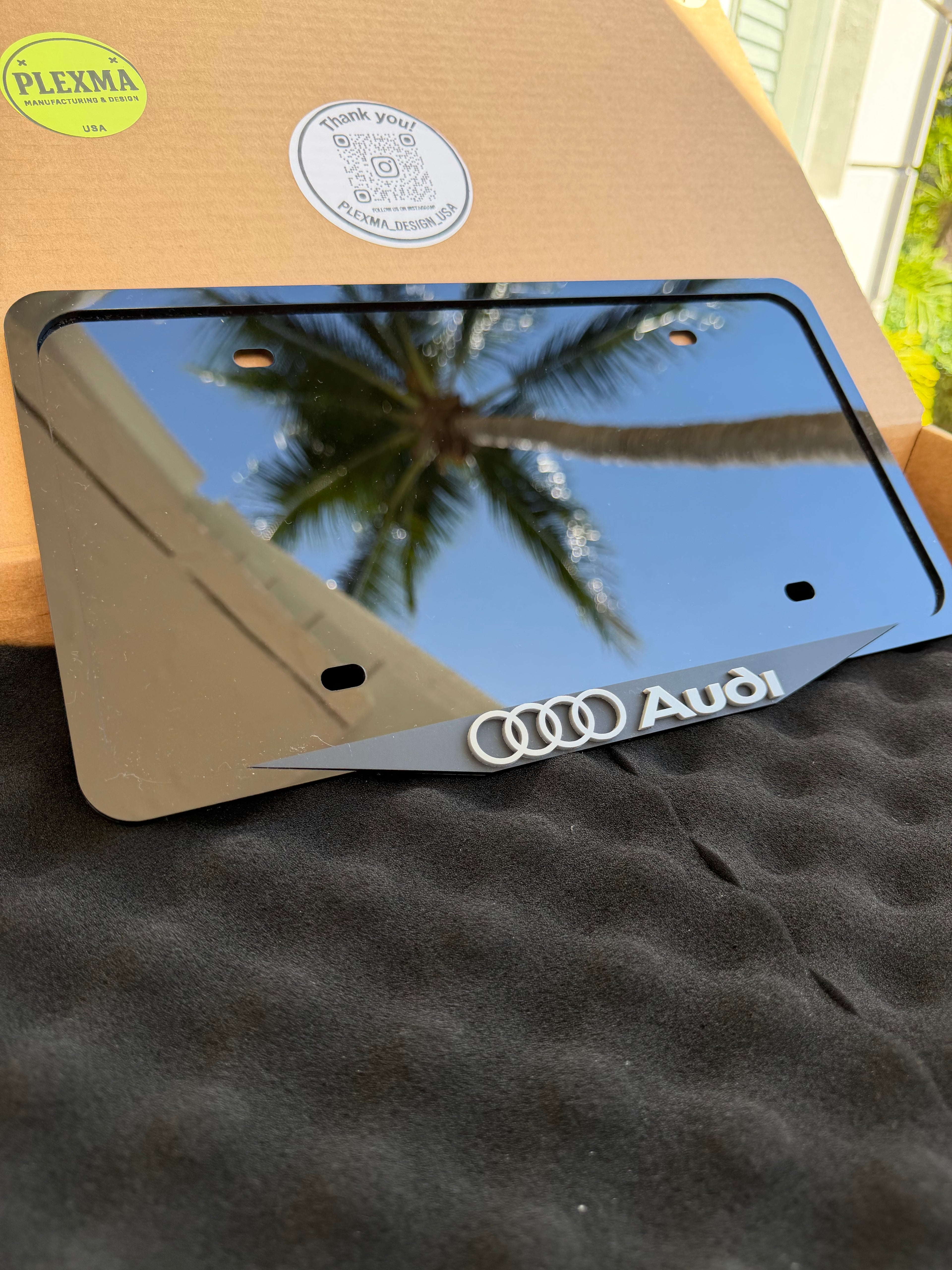 Laser engraved Audi logo license plate frame, 3D layered acrylic, custom car accessory made in USA