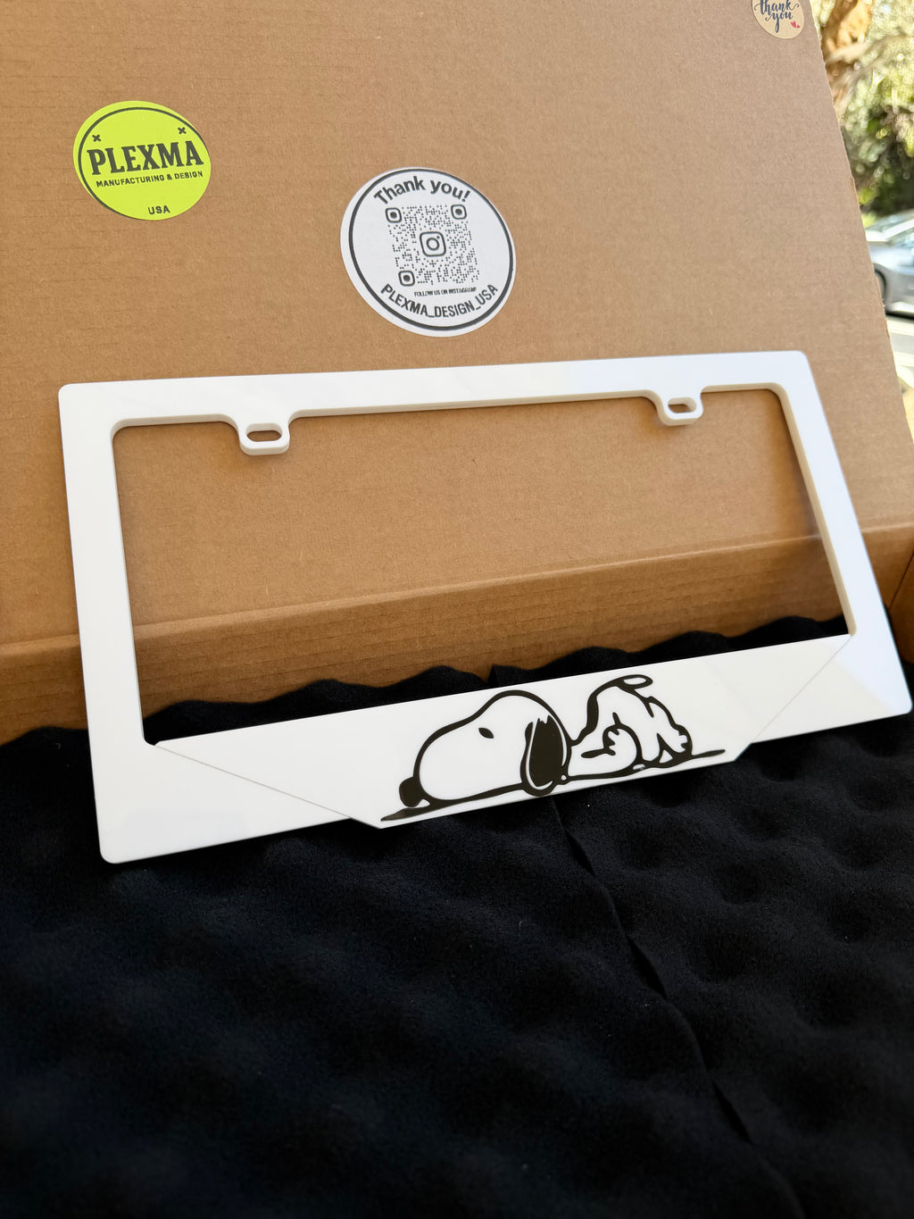 Snoopy themed 3D acrylic license plate frame handmade in the USA