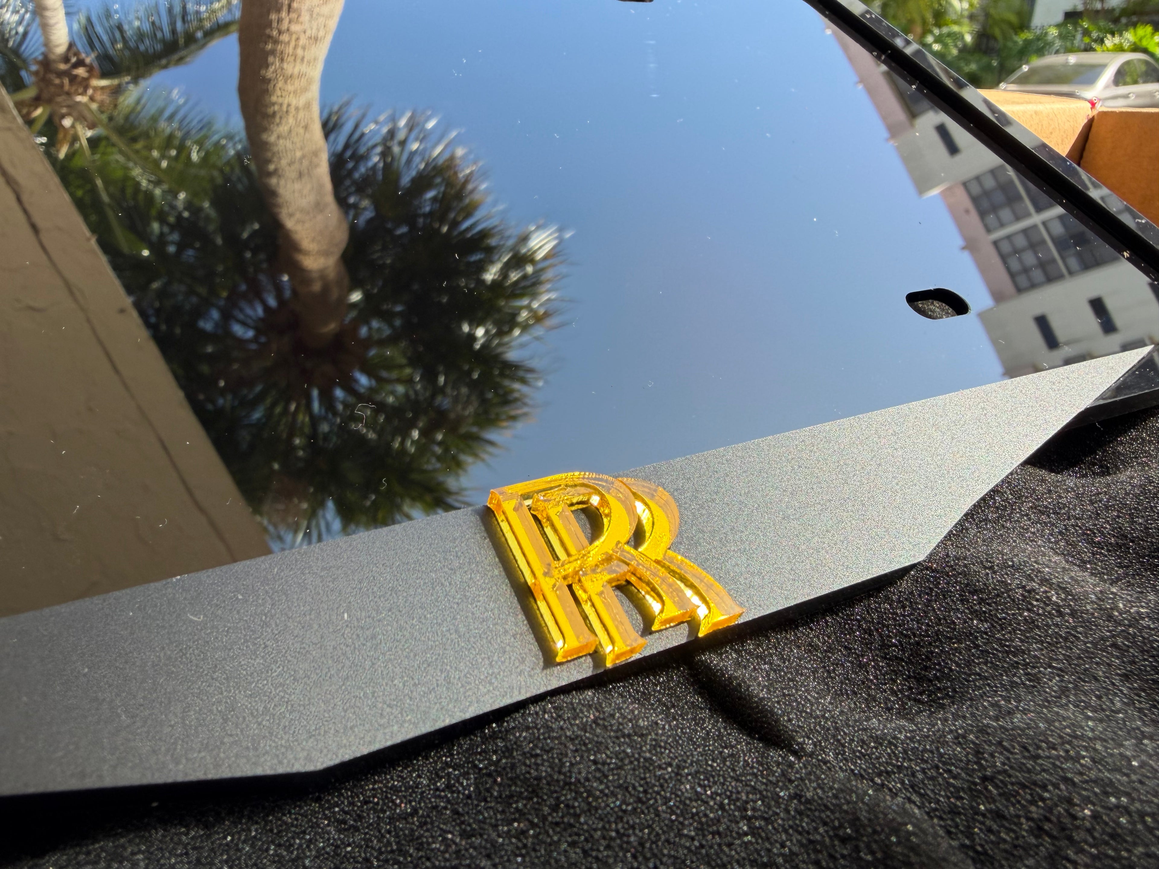 Premium Rolls Royce style custom license plate frame with layered 3D acrylic design