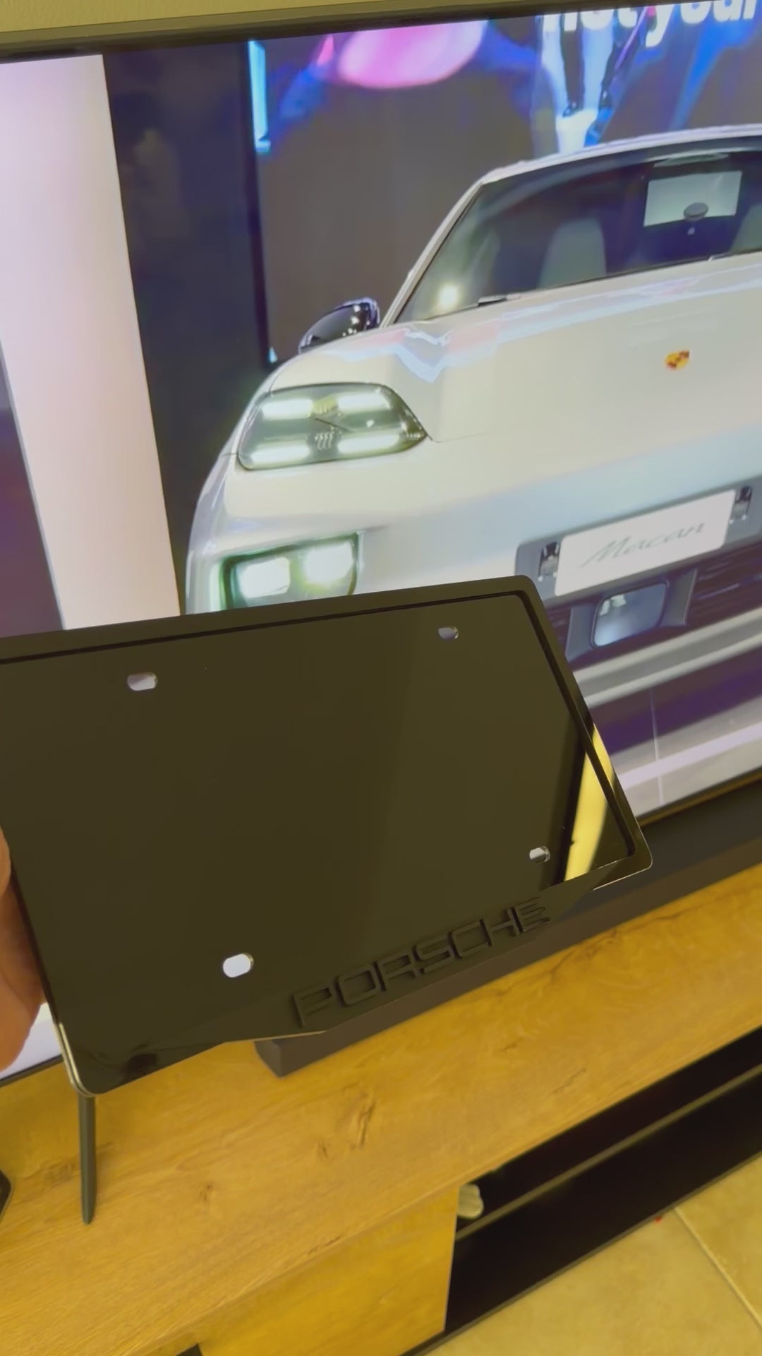 Porsche performance car license plate frame with 3D emblem, high-gloss black acrylic