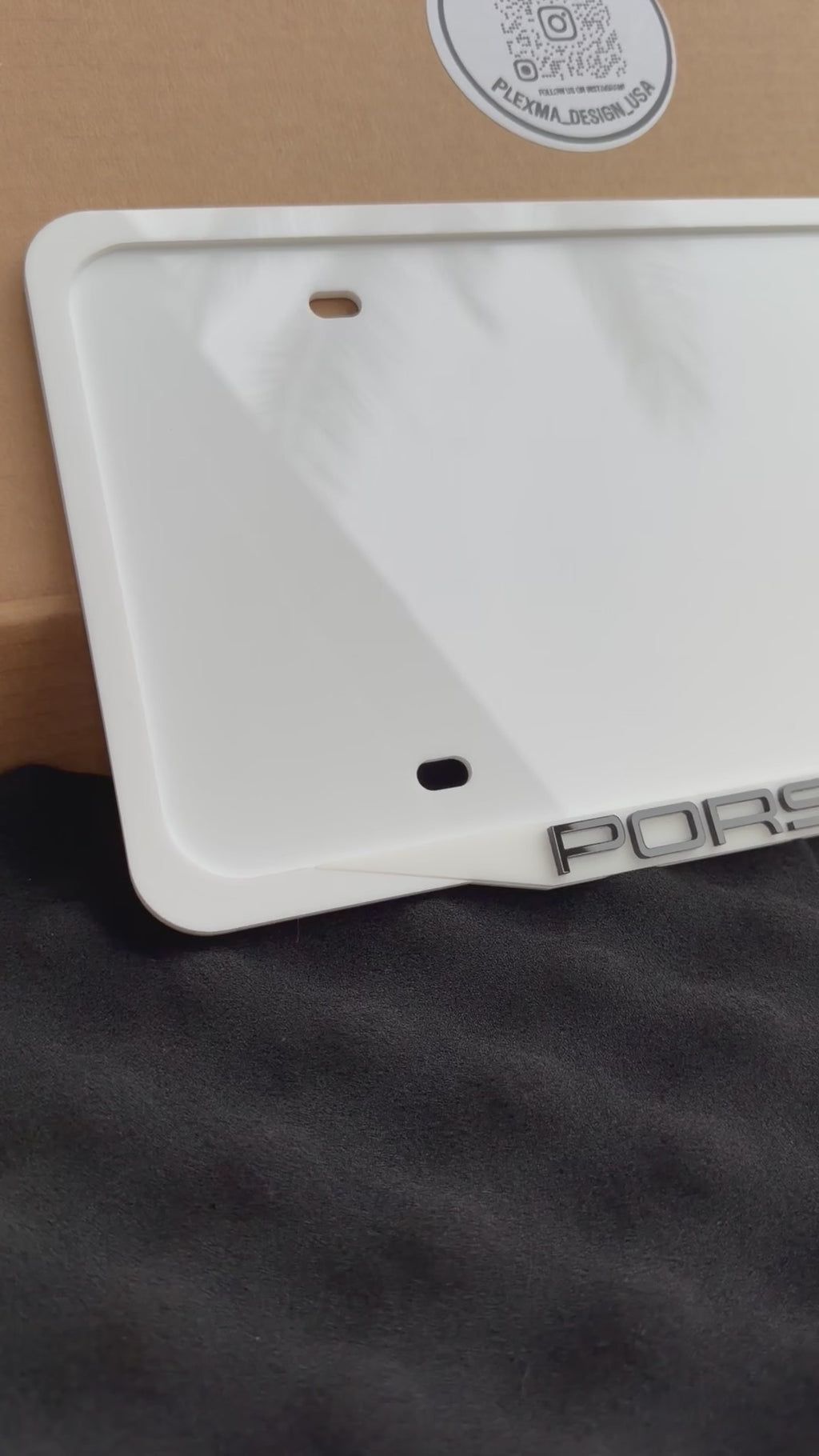 Close up Porsche style 3D acrylic license plate frame glossy white handmade